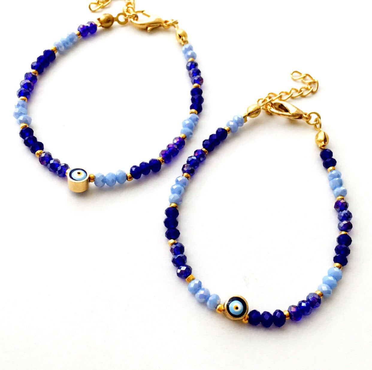 A handmade blue seed beads evil eye bracelet featuring Miyuki beads, symbolizing luck and protection, suitable for unisex wear.