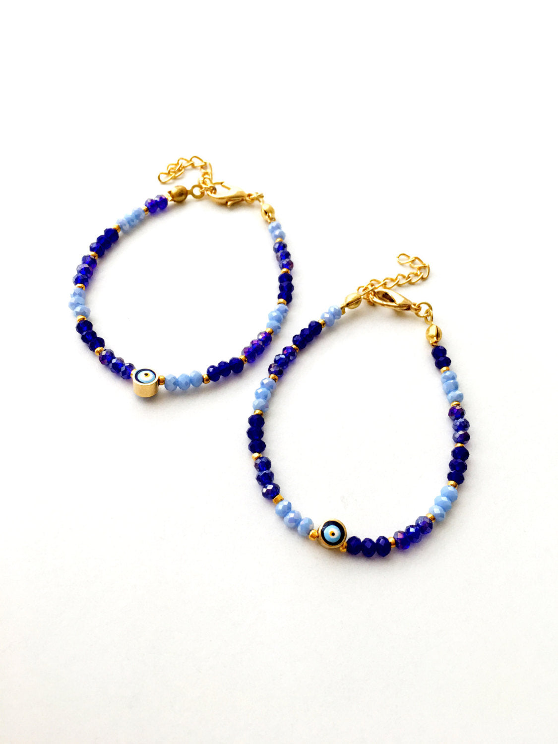 A handmade blue seed beads evil eye bracelet featuring Miyuki beads, symbolizing luck and protection, suitable for unisex wear.