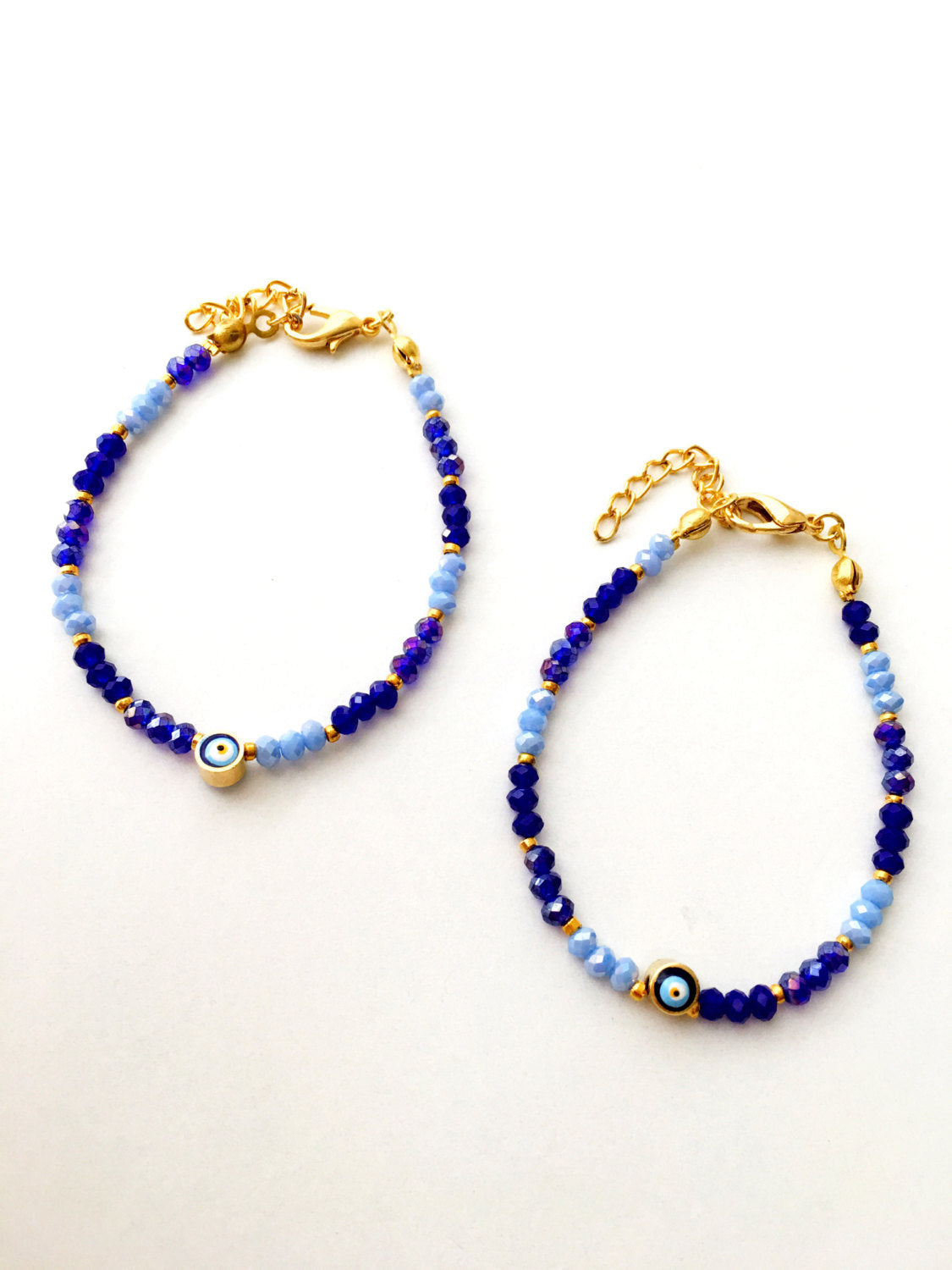 A handmade blue seed beads evil eye bracelet featuring Miyuki beads, symbolizing luck and protection, suitable for unisex wear.