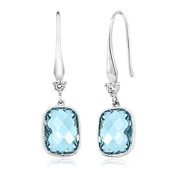 Elegant Blue Topaz Diamond Cut Drop Earrings in 18K White Gold Plated, showcasing their stunning design and craftsmanship.