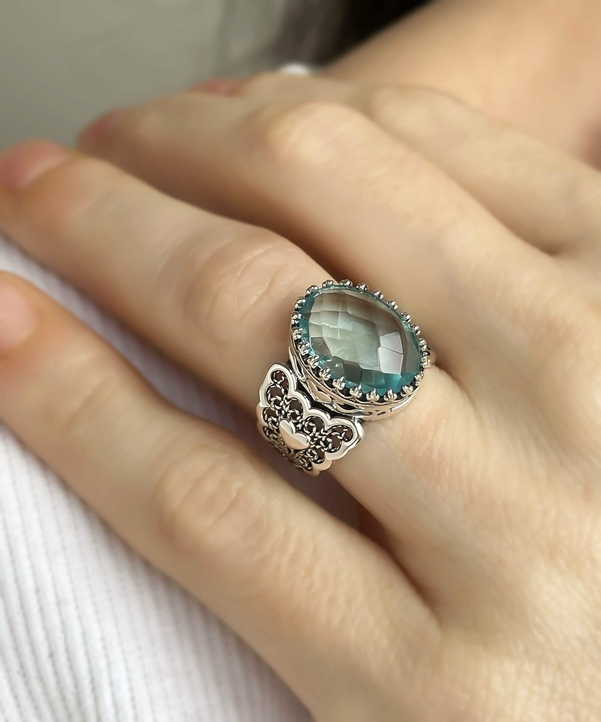 Elegant Blue Topaz Gemstone Double Heart Ring in 925 Sterling Silver with intricate filigree design.