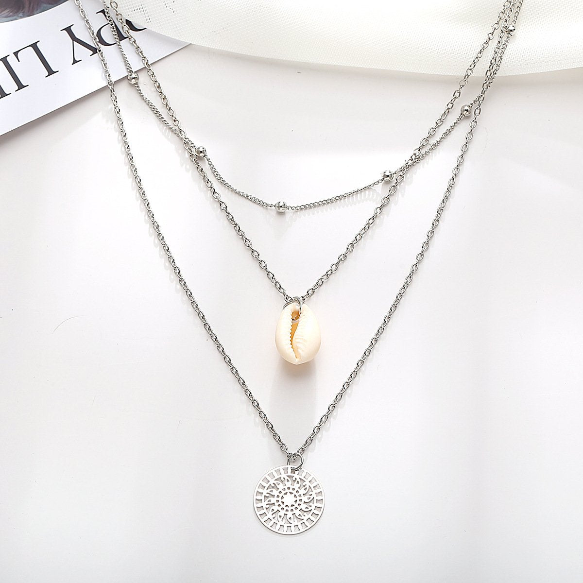 Elegant Bohemian and Shell 3 Piece Layer Necklace, 18K gold plated with a link chain design, featuring a lobster clasp closure.