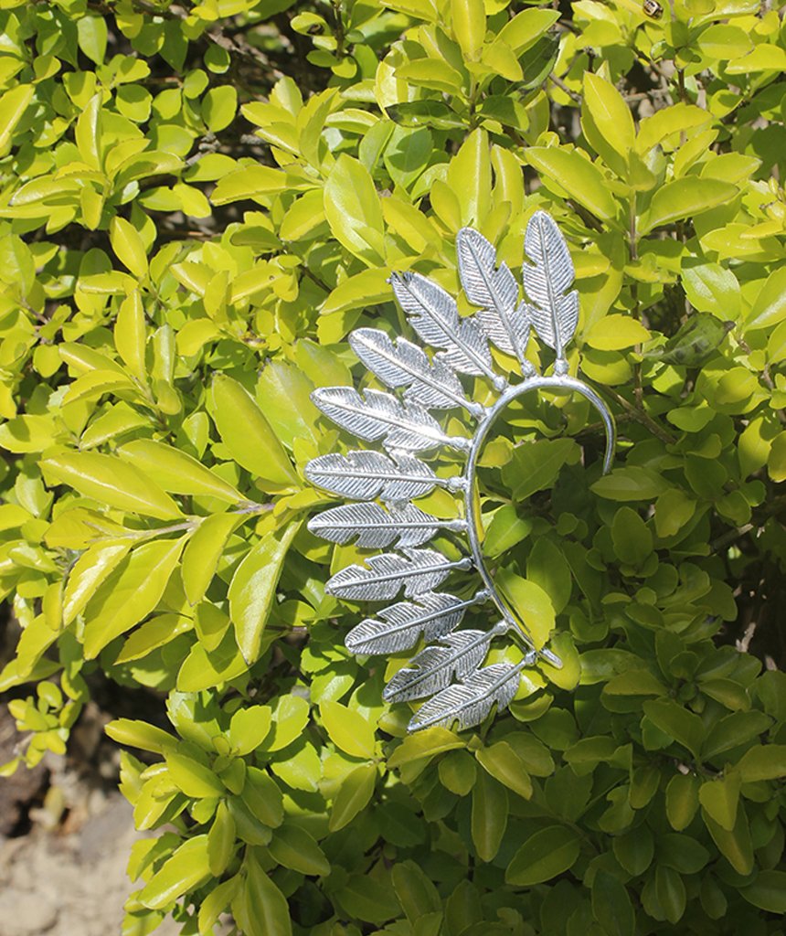 Boho Feather Earcuff in silver and gold, showcasing a unique feather design that elegantly covers the back of the ear.