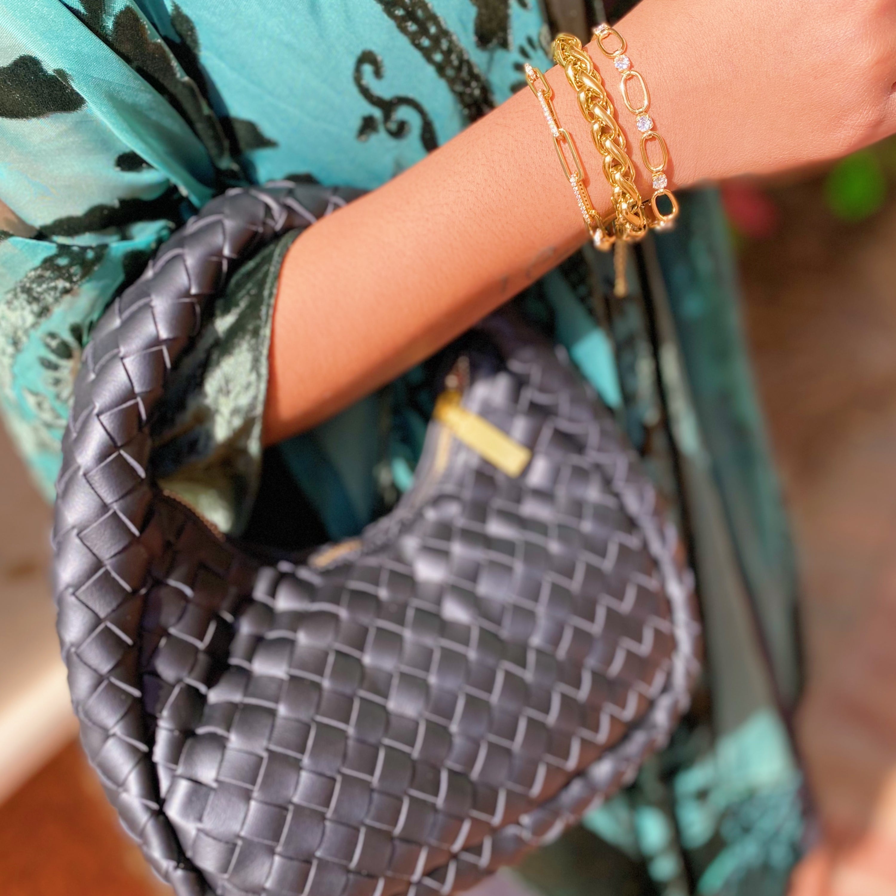 A stylish Bold And Edgy Chain Bracelet featuring small interconnected links, 18k gold plated stainless steel, perfect for layering or as a statement piece.