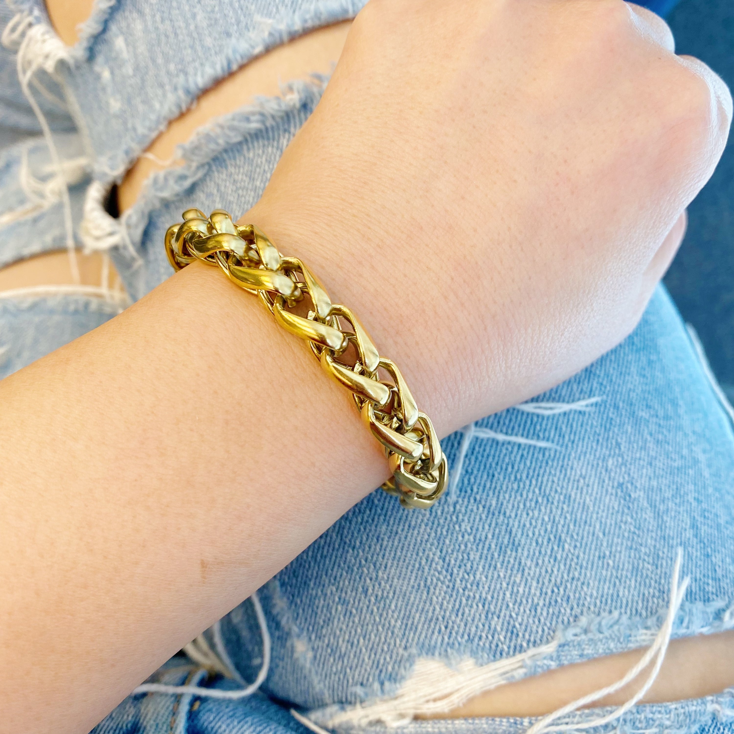 A stylish Bold And Edgy Chain Bracelet featuring small interconnected links, 18k gold plated stainless steel, perfect for layering or as a statement piece.