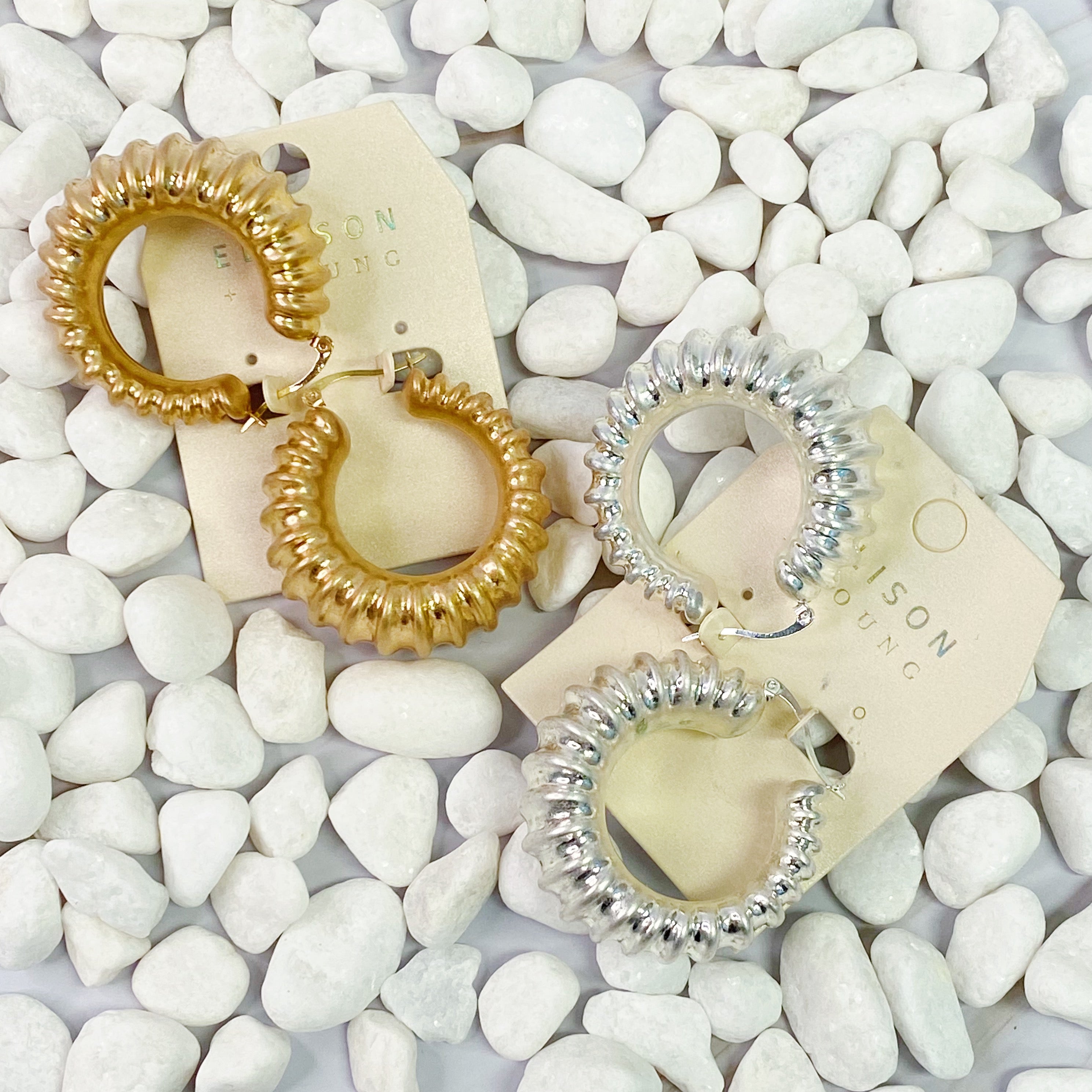 Bold In Pleats Hoop Earrings featuring a unique pleated texture, gold plated alloy metal, and lightweight design, perfect for everyday wear.