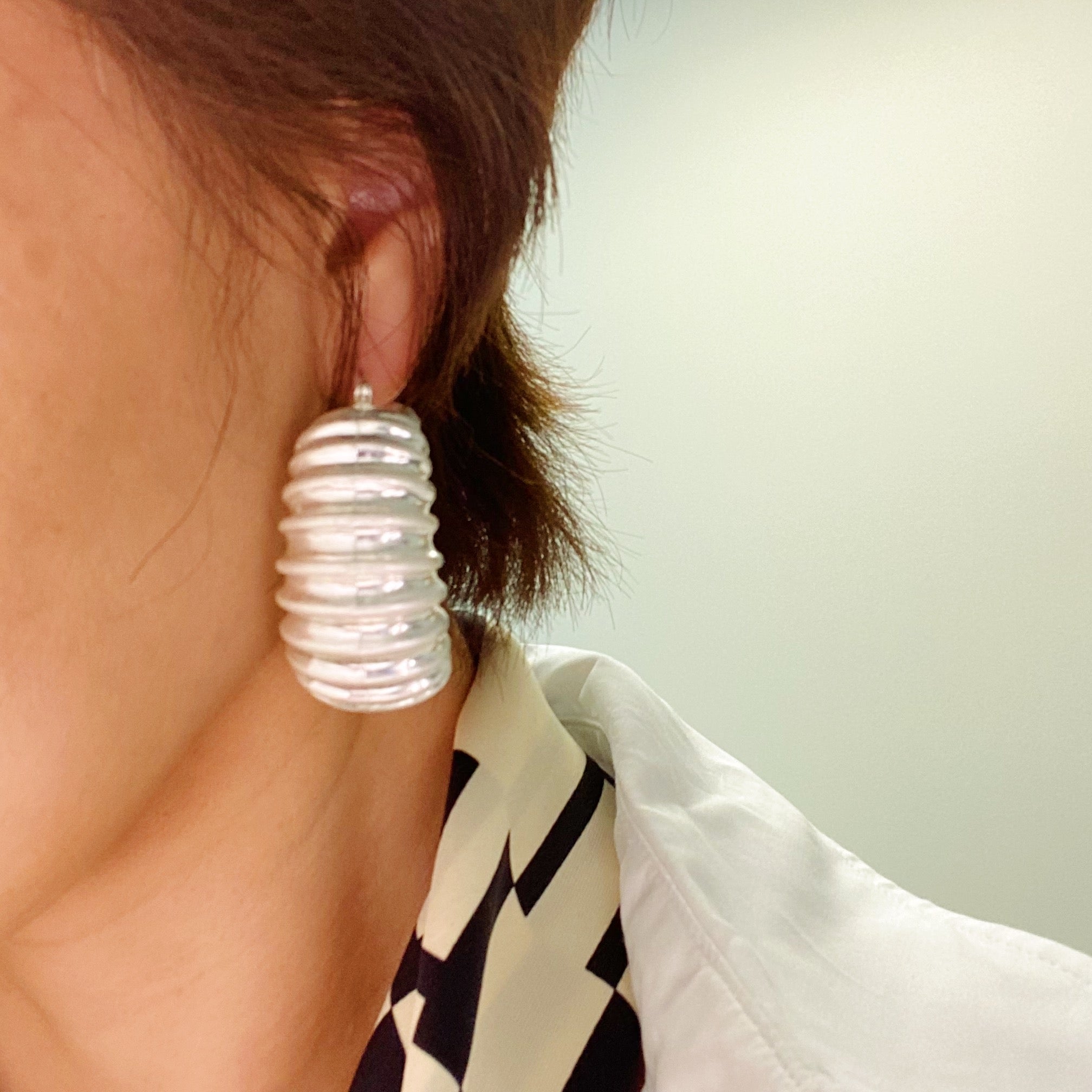 Bold In Pleats Hoop Earrings featuring a unique pleated texture, gold plated alloy metal, and lightweight design, perfect for everyday wear.