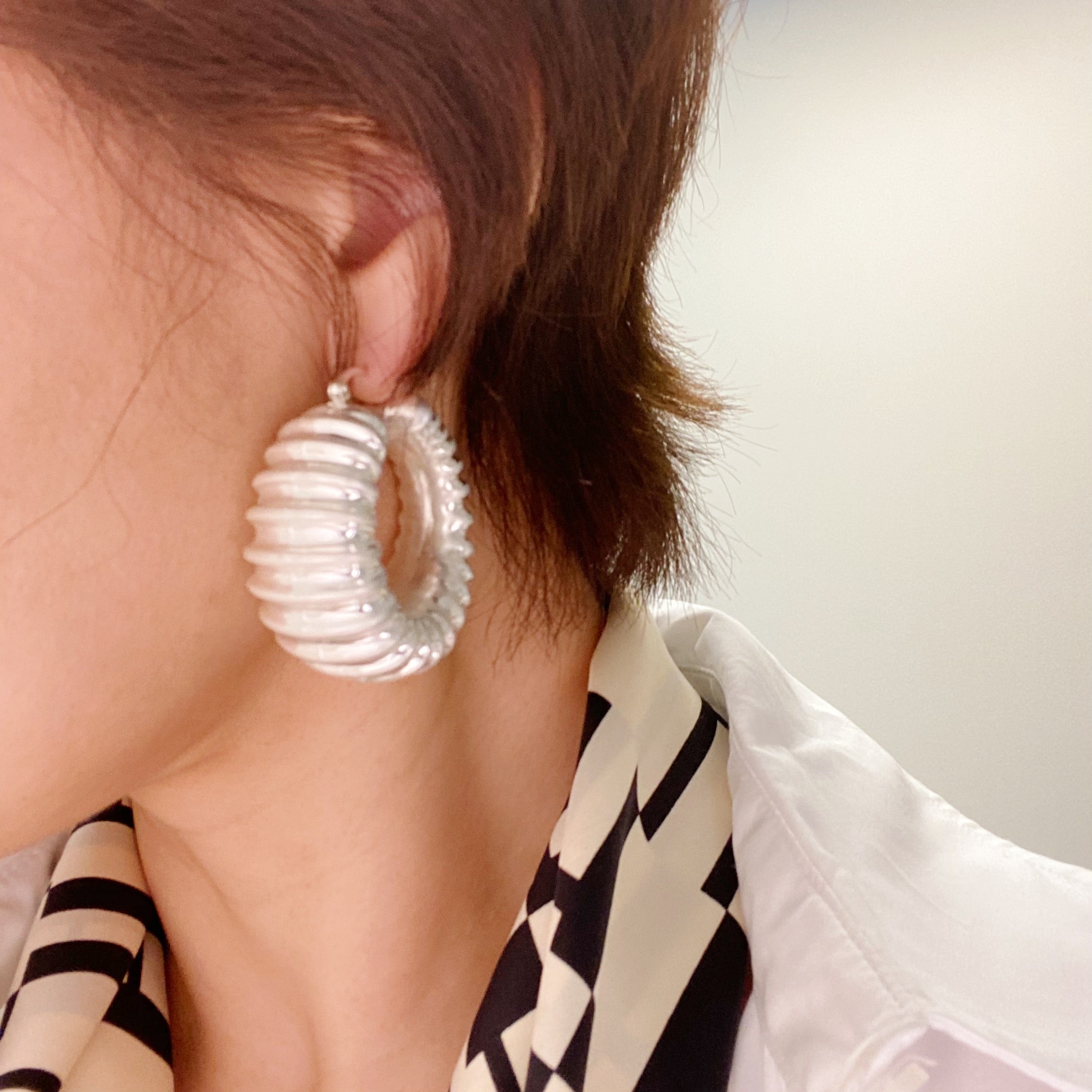Bold In Pleats Hoop Earrings featuring a unique pleated texture, gold plated alloy metal, and lightweight design, perfect for everyday wear.