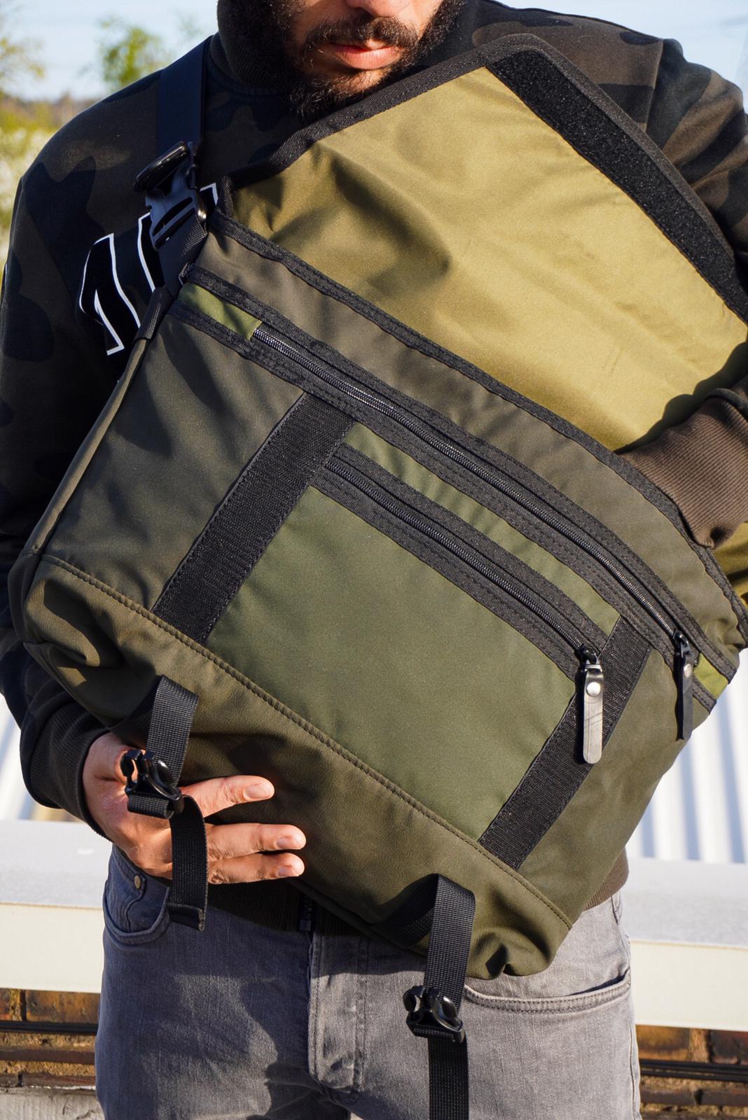 Bradley Upcycled Water Resistant Bike Messenger Bag made from reclaimed materials, featuring adjustable straps and a padded laptop compartment.