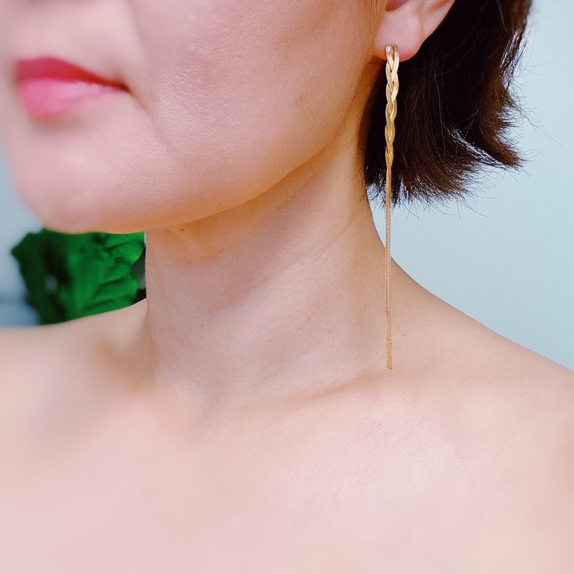 Elegant Braided Herringbone Chain Drop Earrings in 18k gold plating, showcasing a unique braided design and drop style.