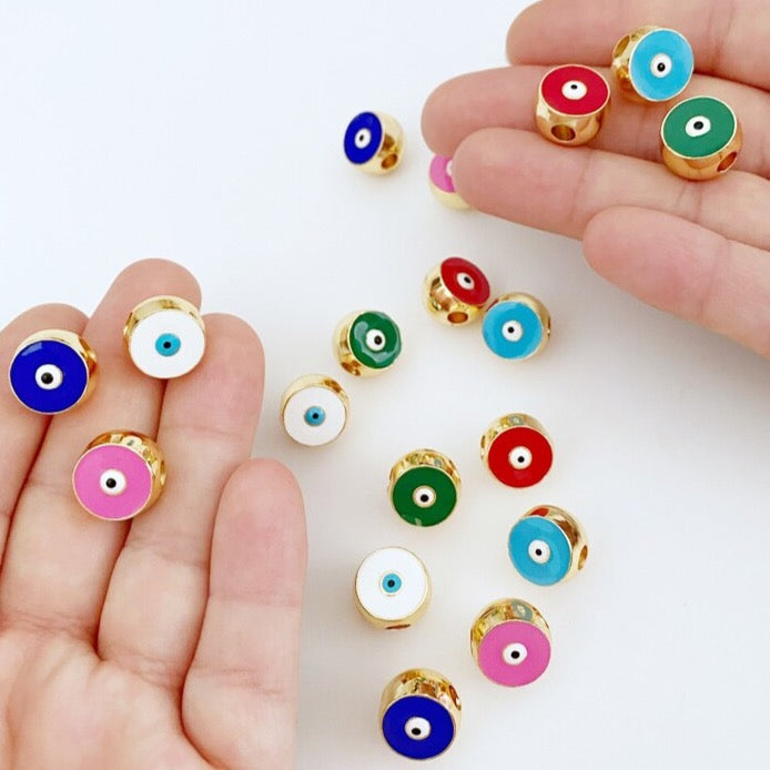 Brass Evil Eye Bead DIY in pink, red, and white colors, perfect for jewelry making.