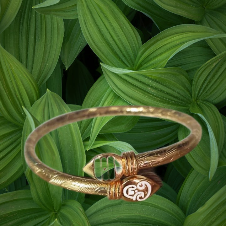 Gold-plated Brass Kada with arrowhead design, adjustable for comfort, ideal for meditation and spiritual healing.