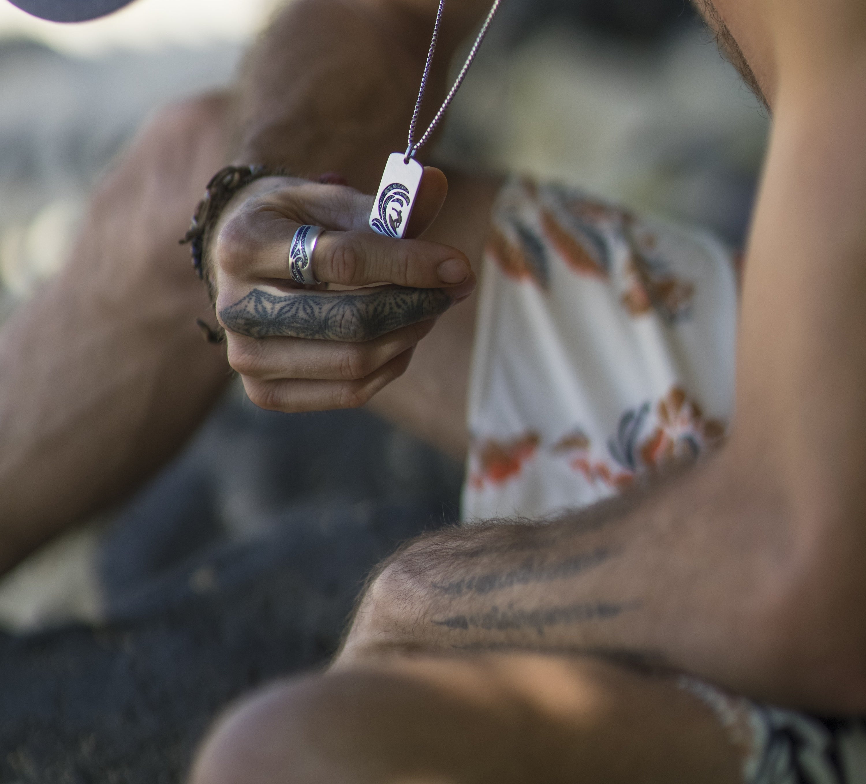 Breaking Waves Sterling Silver Ring with blue sapphire and topaz stones, featuring ocean wave motifs.