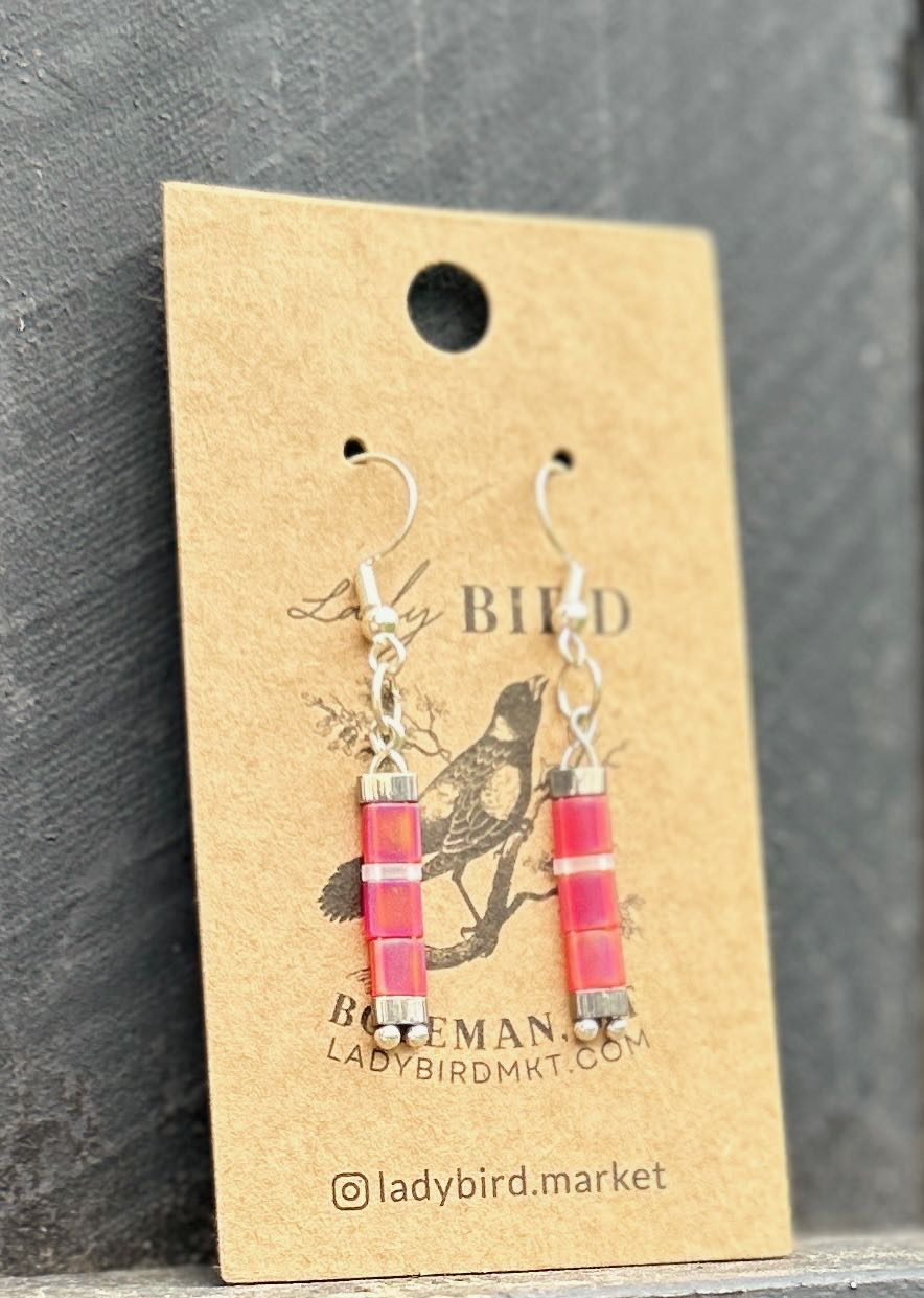 Bright Pink and White Striped Silver Tila Bead Earrings, showcasing vibrant colors and unique design.