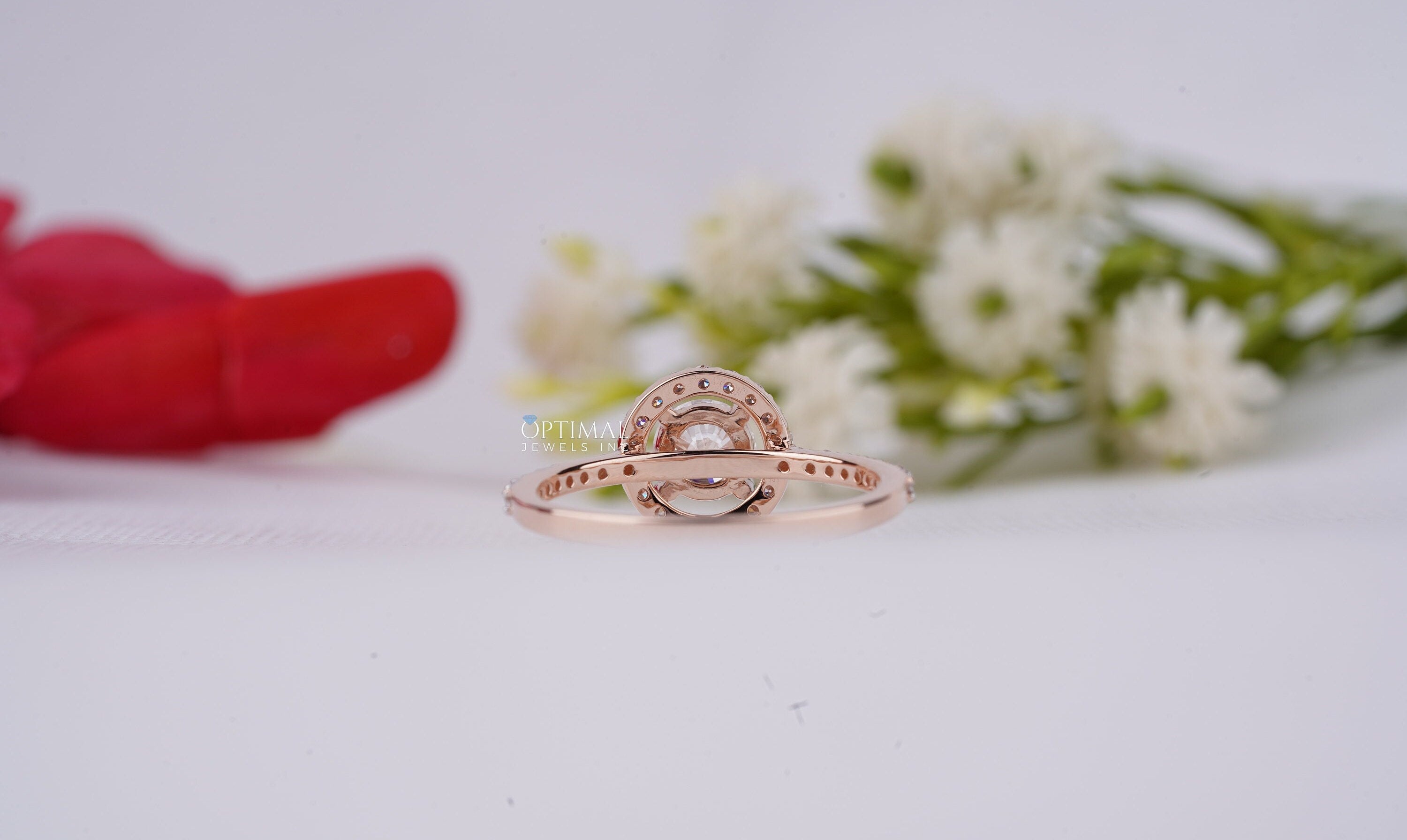 Brilliant Round Cut Lab Diamond Wedding Ring in rose gold, featuring a 1.50 Ctw IGI Certified center stone with side stones.