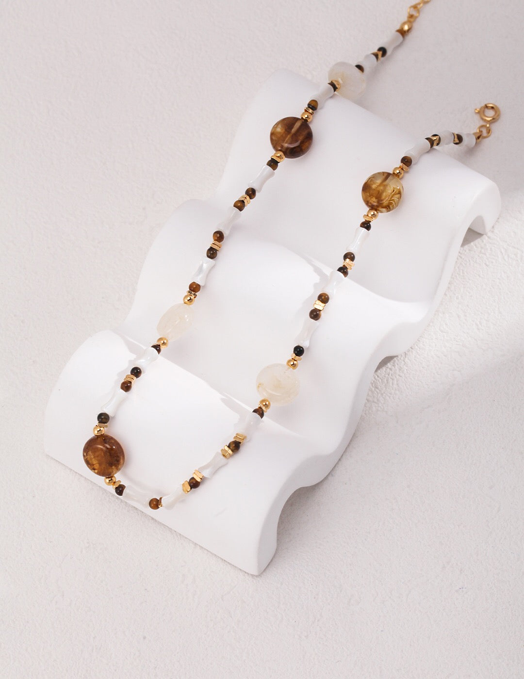 Brown Tiger Eye Stone Shell Beaded Necklace featuring coffee-beige round disc beads, natural sea shell tube beads, and gold vermeil accents.
