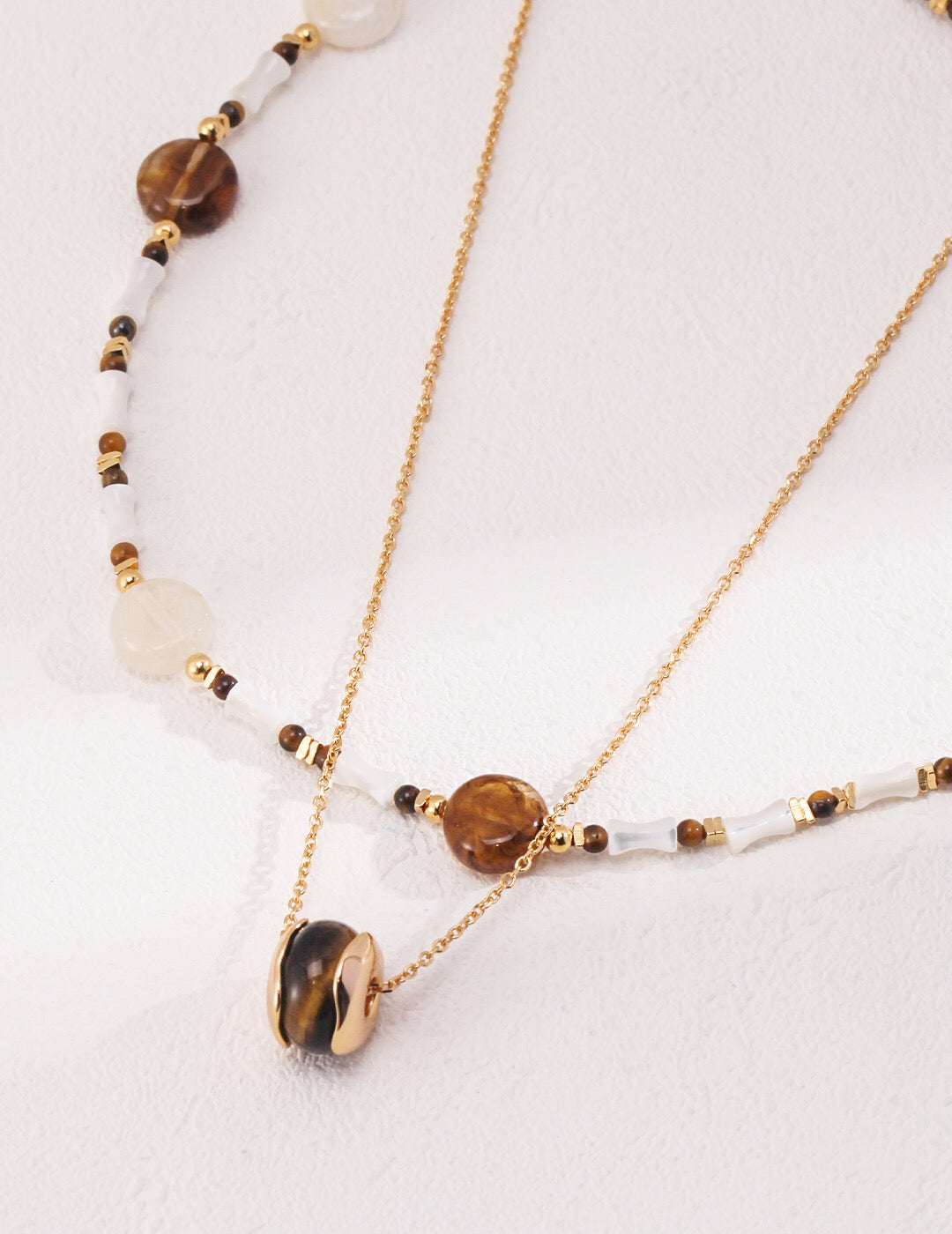 Brown Tiger Eye Stone Shell Beaded Necklace featuring coffee-beige round disc beads, natural sea shell tube beads, and gold vermeil accents.
