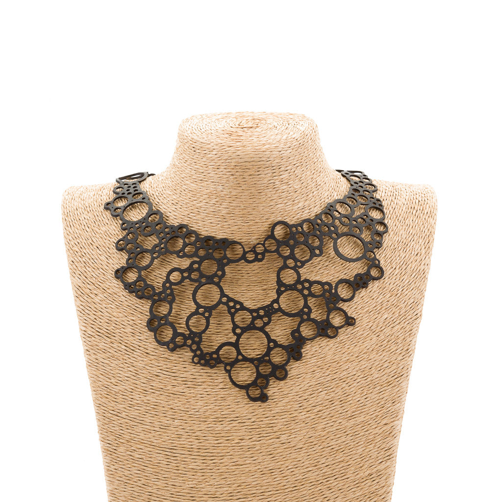 Bubbles Recycled Rubber Necklace made from reclaimed rubber inner tubes, showcasing a unique bubble-inspired design.