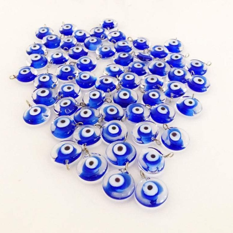 A collection of 100 blue glass evil eye charms, handmade Murano glass beads with a vibrant blue color, ideal for DIY jewelry projects.