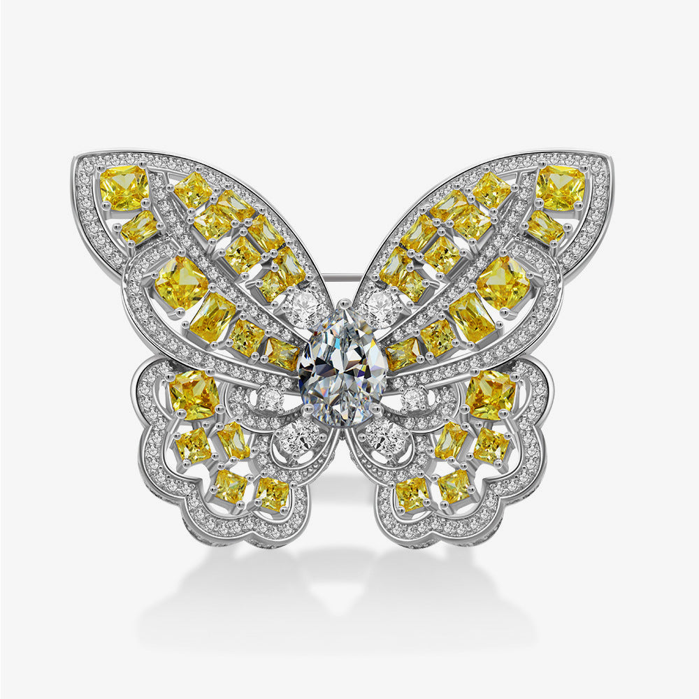 Elegant Butterfly Brooch made of 925 sterling silver with yellow citrine and white cubic zirconia, showcasing intricate craftsmanship.