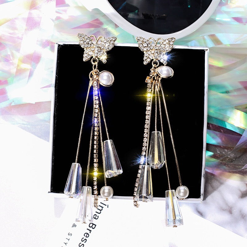 Elegant butterfly earrings featuring pearl and crystal tassels, crafted from 925 silver.