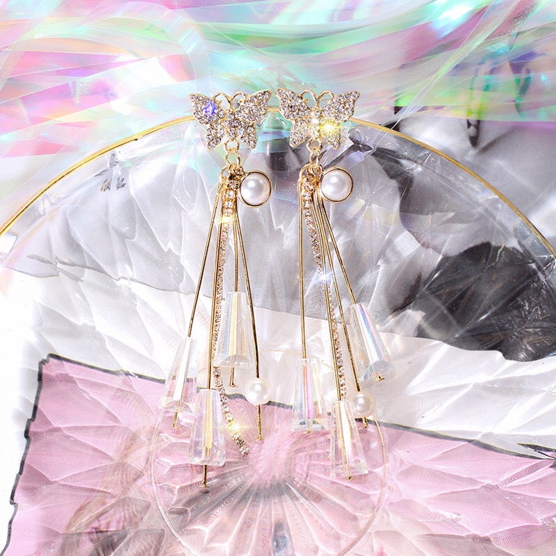 Elegant butterfly earrings featuring pearl and crystal tassels, crafted from 925 silver.