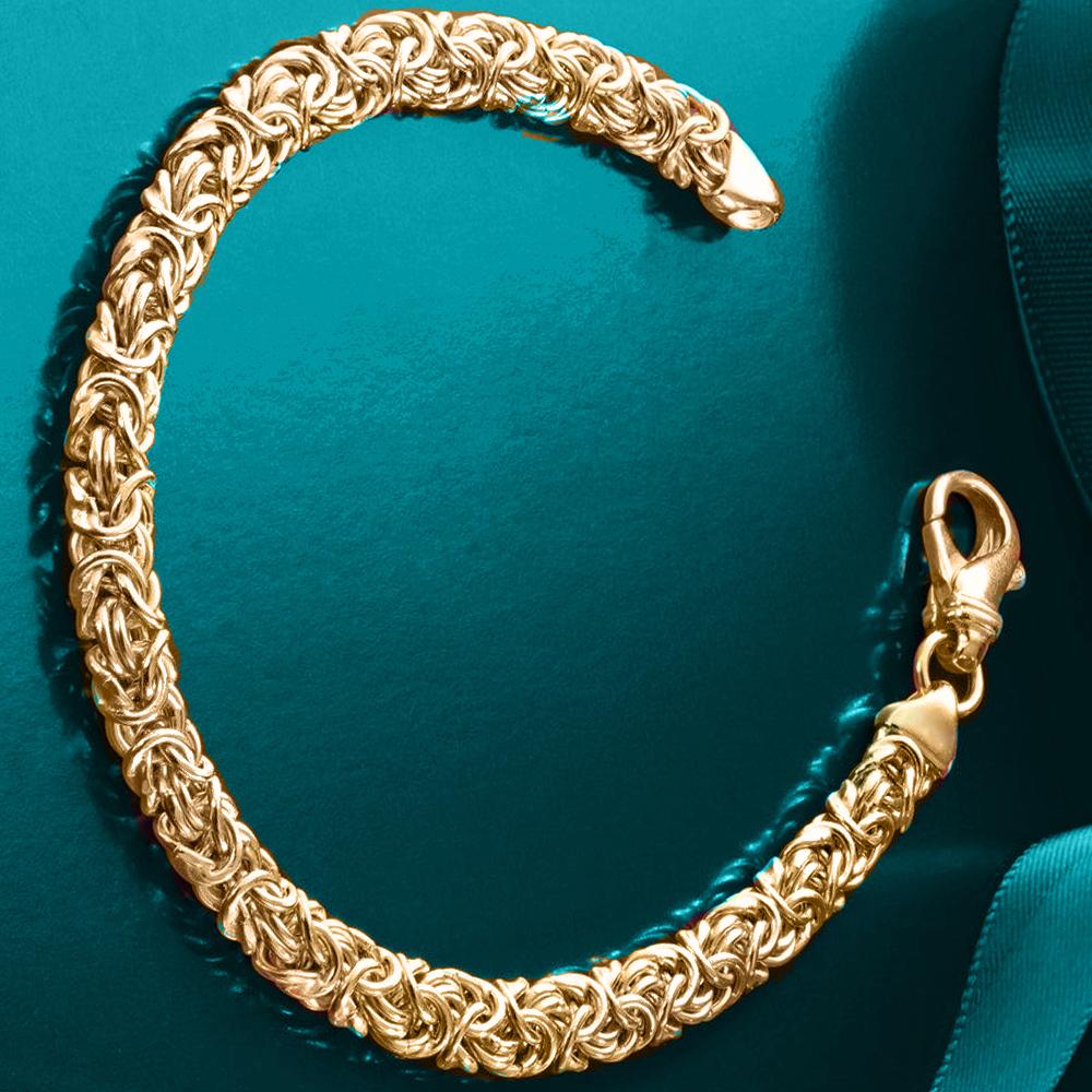 Byzantine Chain Bracelet in 18K Gold Plated, featuring intricate links and a lobster clasp, elegantly displayed on a soft surface.