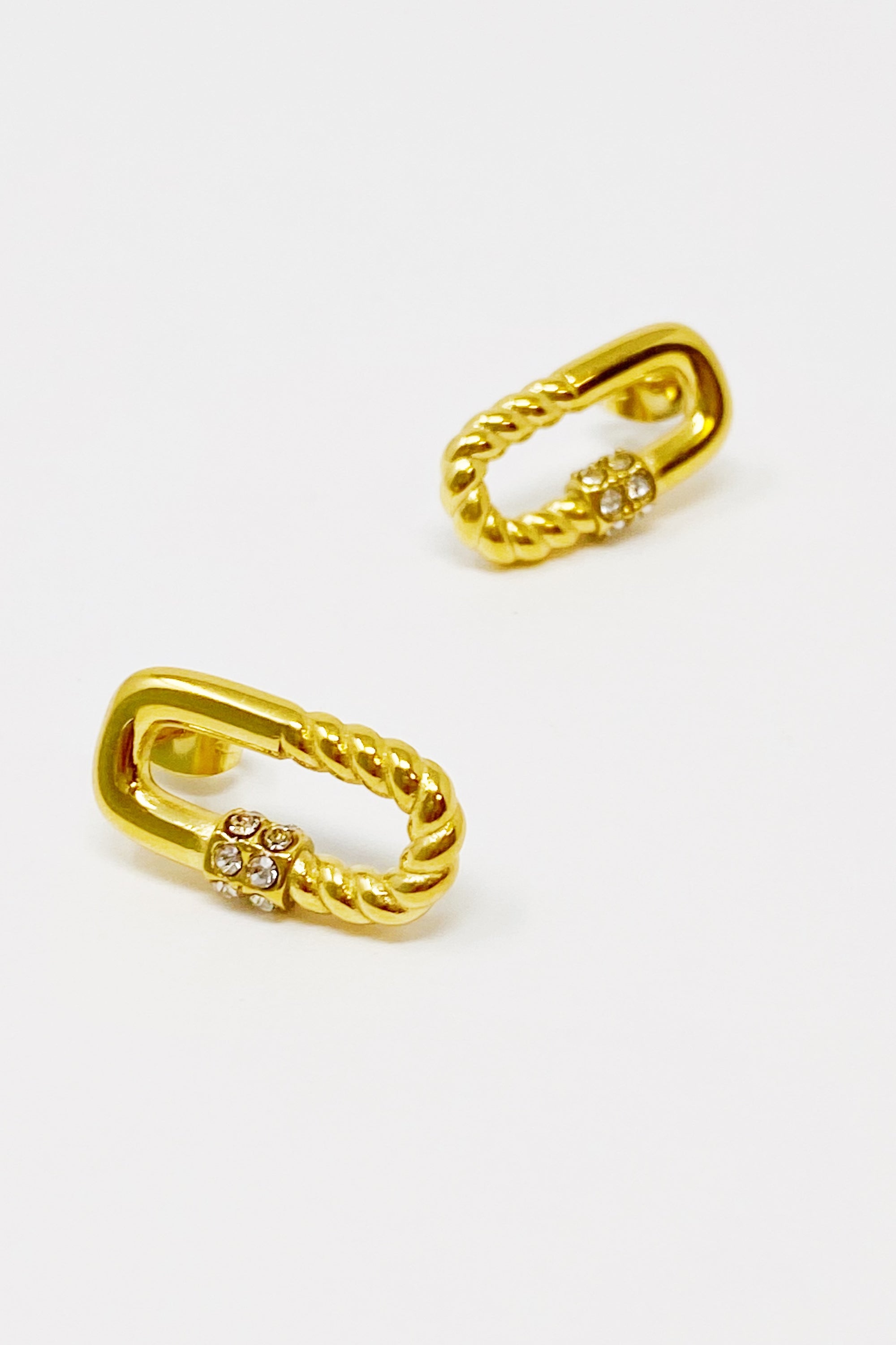 Stylish Cabled Link Stud Earrings in 18K gold plating, featuring a unique design with cubic zirconia accents.