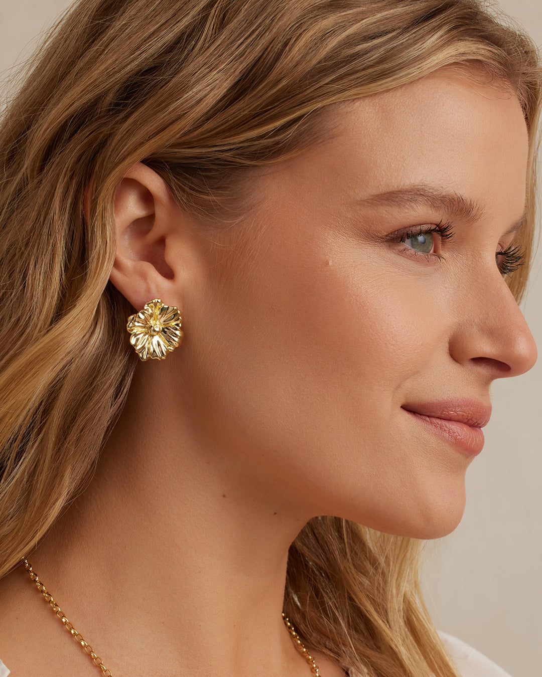 A pair of elegant Camila Studs featuring a sleek and minimal design, perfect for enhancing any outfit.