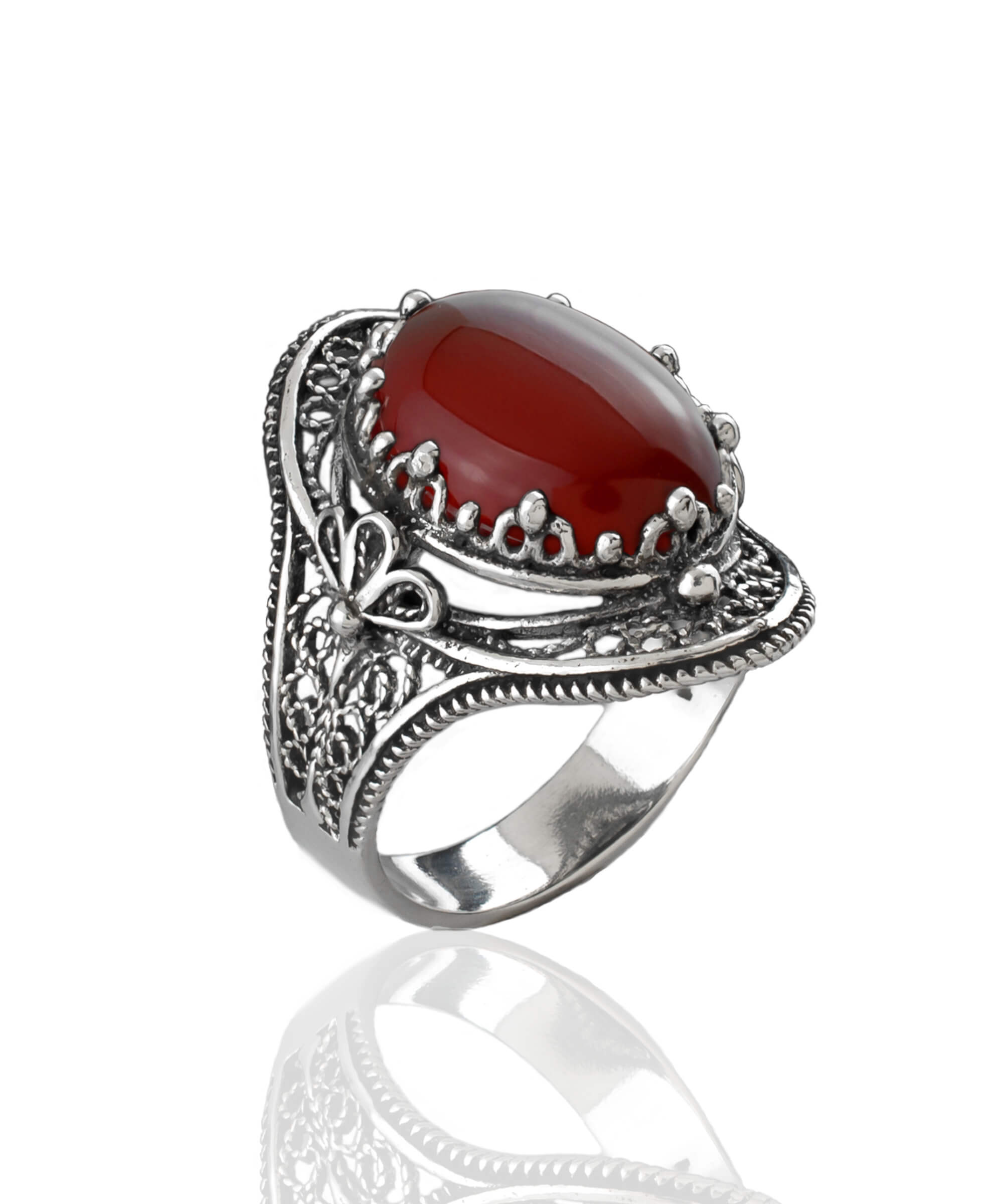 Carnelian Gemstone Filigree Art Woman Silver Statement Ring featuring an oval cut carnelian and intricate daisy filigree design.