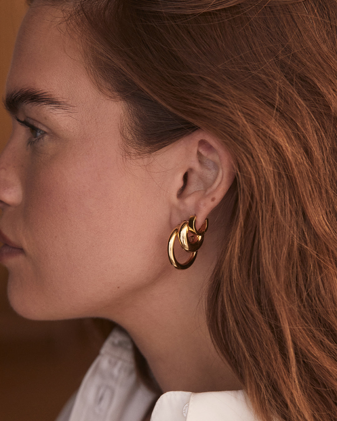 Carter Small Hoops, elegant lightweight earrings perfect for any occasion, showcasing a timeless design.