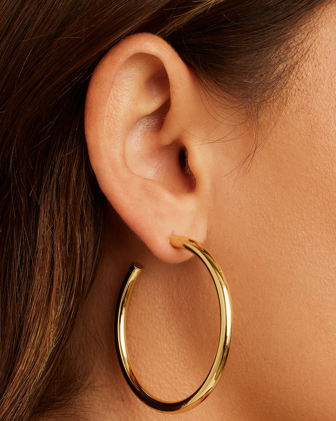 Carter Statement Hoops showcasing a bold and elegant design, perfect for elevating any outfit.