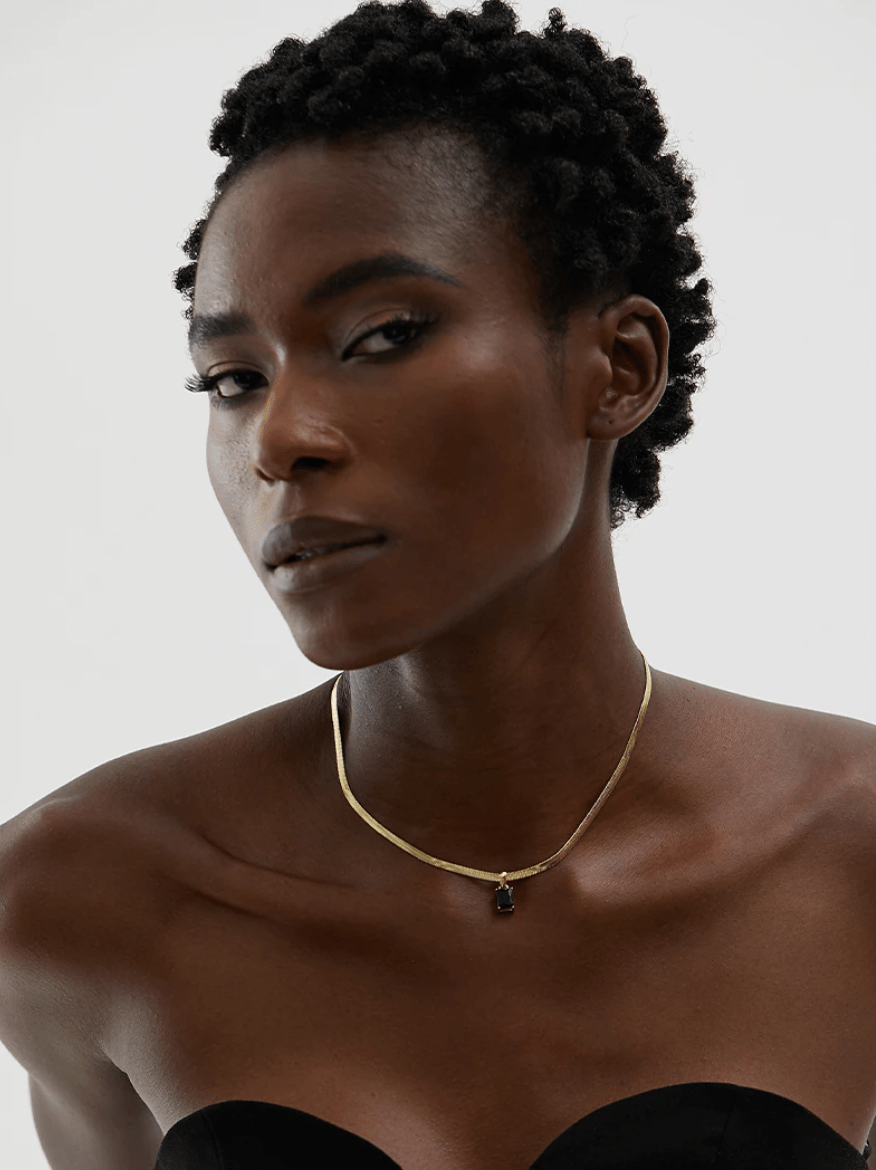 Cassidy Snake Chain Crystal Charm Necklace featuring multi-coloured zircon crystals and a gold-plated stainless steel snake chain.