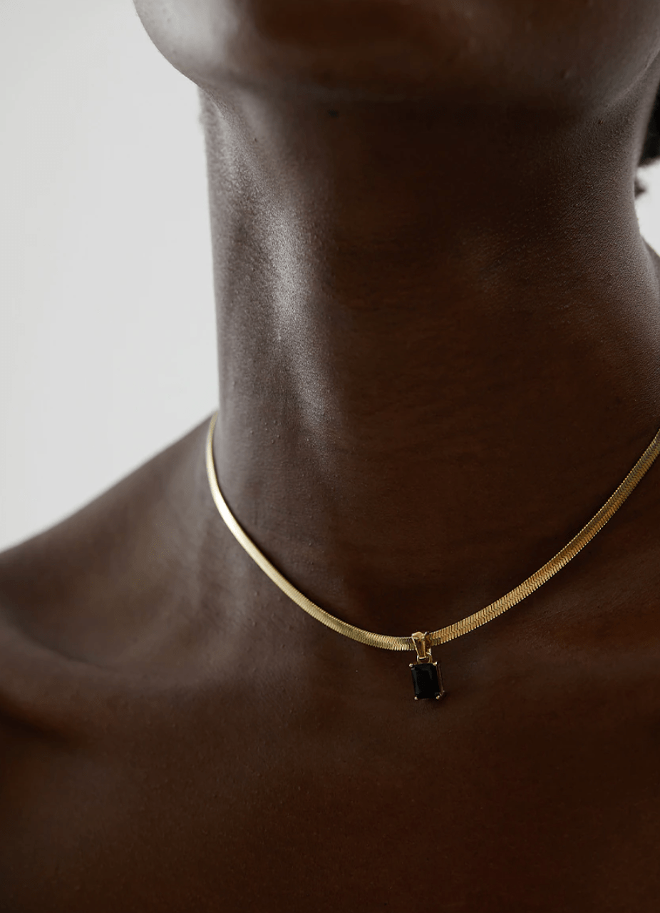 Cassidy Snake Chain Crystal Charm Necklace featuring multi-coloured zircon crystals and a gold-plated stainless steel snake chain.