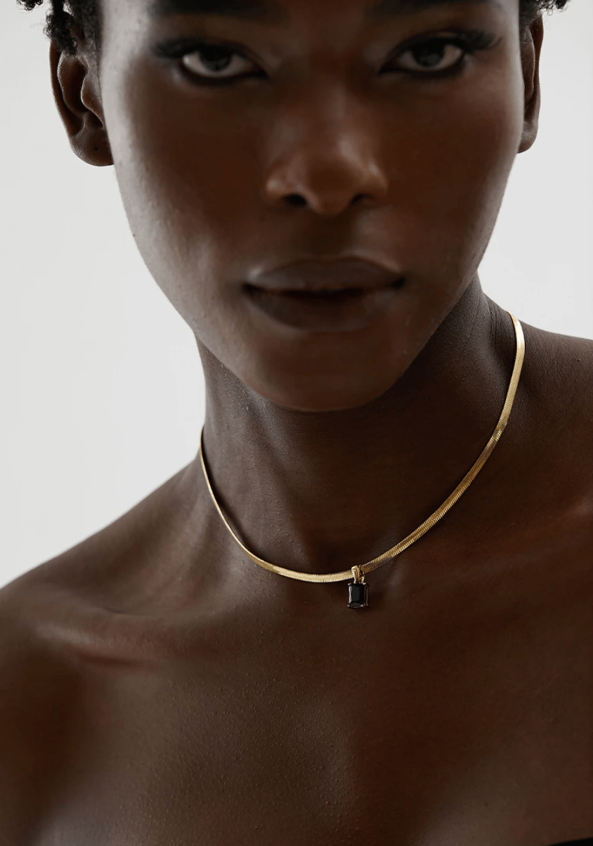 Cassidy Snake Chain Crystal Charm Necklace featuring multi-coloured zircon crystals and a gold-plated stainless steel snake chain.