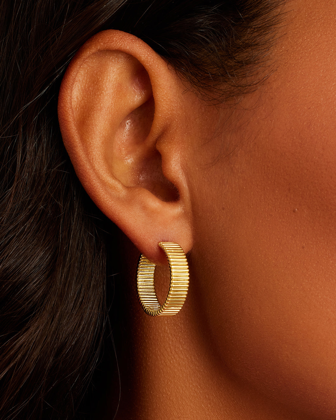 Elegant Catalina Hoops earrings, showcasing their lightweight design and quality craftsmanship.