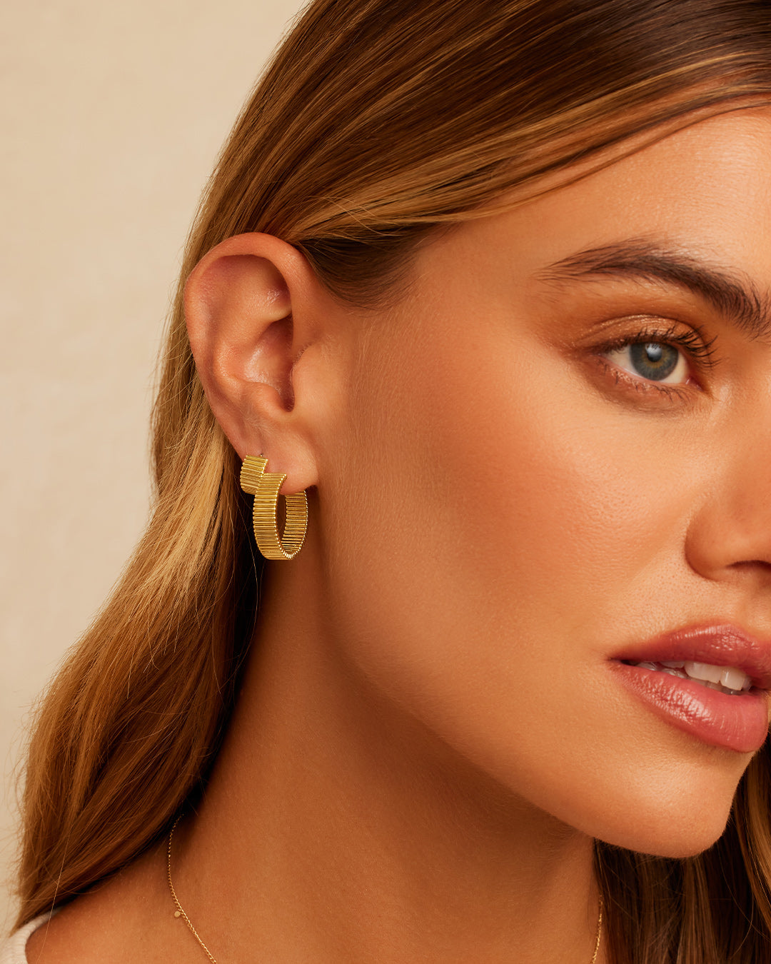 Elegant Catalina Hoops earrings, showcasing their lightweight design and quality craftsmanship.