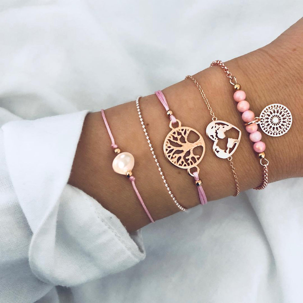 Celestial Marble Crystals and Gemstone 5 Piece Bracelet Set featuring 14K gold plating, black marble design, and white crystal accents.