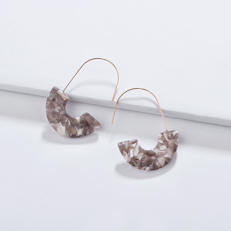 Colorful Celluloid Hook Hoop Earrings by DOBBI, showcasing vibrant hues and a stylish design, perfect for summer wear.