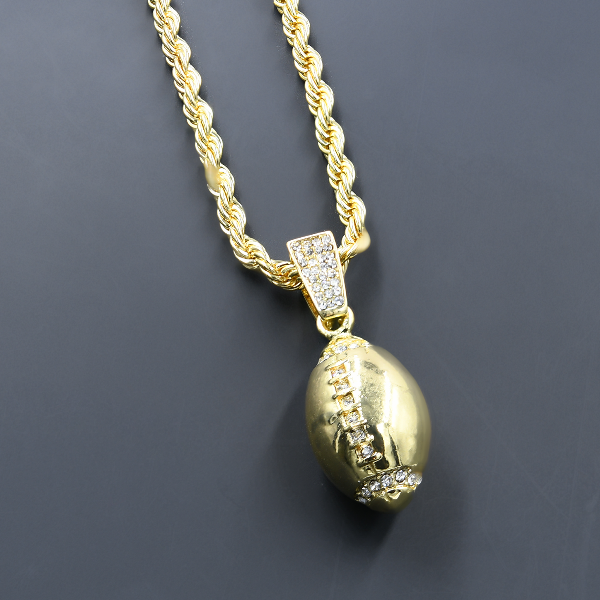 CHAIN AND CHARM - D911202 featuring a crystal-studded pendant on a 24'' rope chain, showcasing intricate design and hip-hop style.