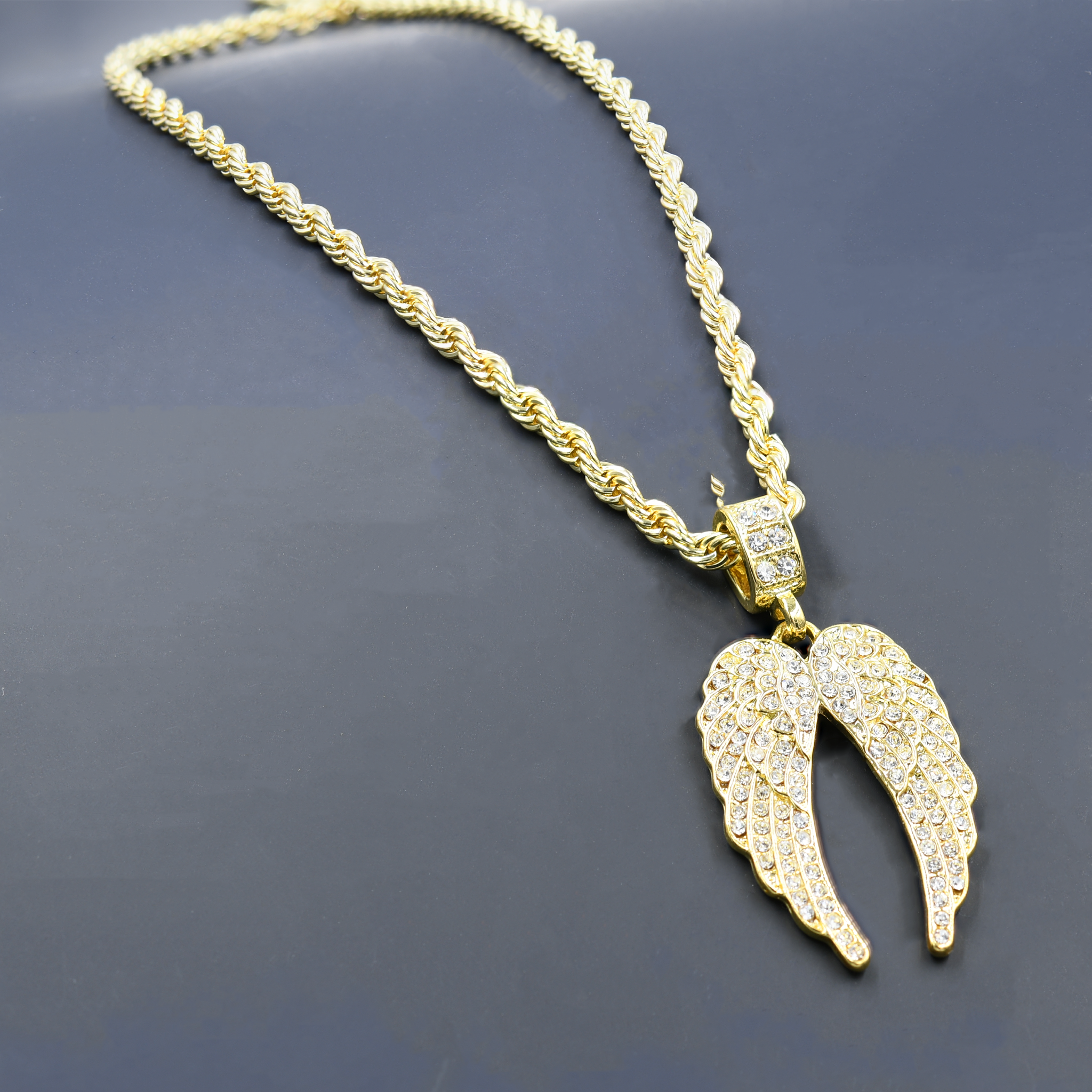 CHAIN AND CHARM - D930122 featuring a crystal stone studded pendant on a 24'' rope chain, showcasing intricate hip-hop jewelry design.