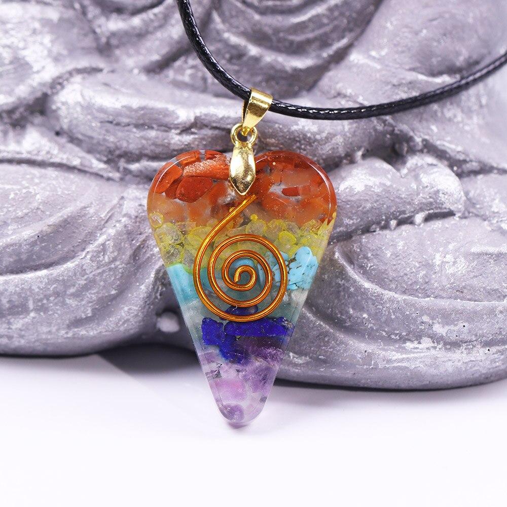 Chakra Orgonite Energy Crystal Pendant featuring various natural crystals in a geometric design, perfect for meditation and aura enhancement.