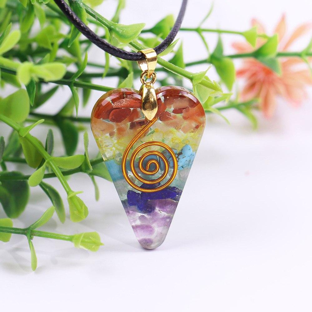 Chakra Orgonite Energy Crystal Pendant featuring various natural crystals in a geometric design, perfect for meditation and aura enhancement.