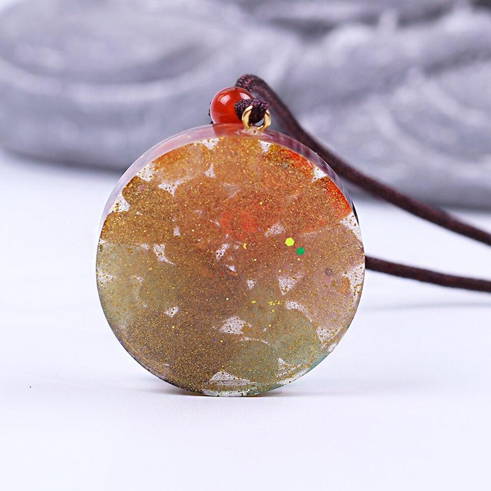Chakra Orgonite Energy Pendant Necklace featuring Sri Yantra symbol, crafted with natural gemstones and zinc alloy.