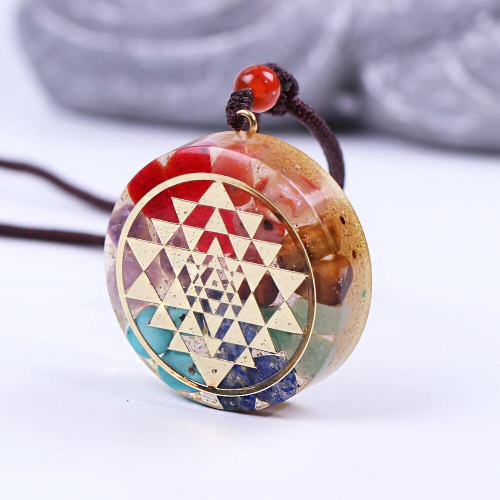 Chakra Orgonite Energy Pendant Necklace featuring Sri Yantra symbol, crafted with natural gemstones and zinc alloy.