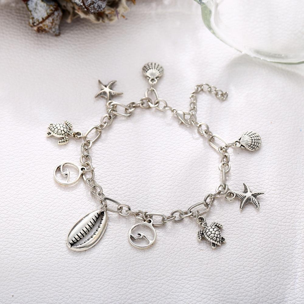 Charm Bracelet of the Sea featuring 18K white gold plating, elegantly designed in Italy, showcasing a beautiful and durable finish.