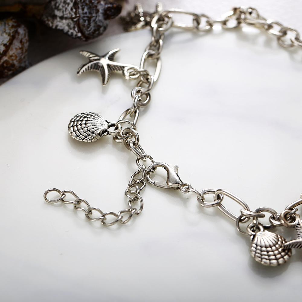 Charm Bracelet of the Sea featuring 18K white gold plating, elegantly designed in Italy, showcasing a beautiful and durable finish.