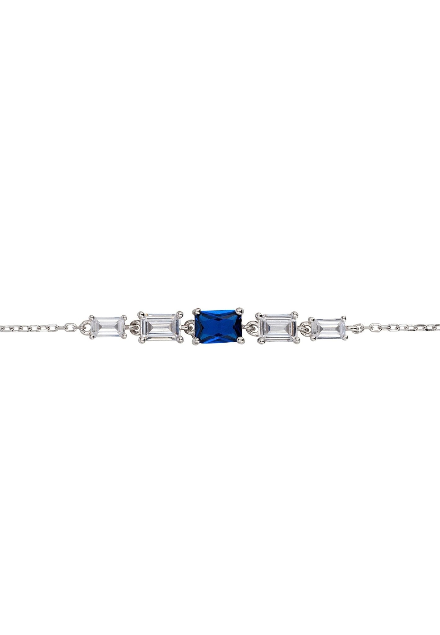 Clara Gemstone Bracelet featuring a lab-created sapphire and cubic zirconia accents on a silver chain, showcasing elegance and luxury.