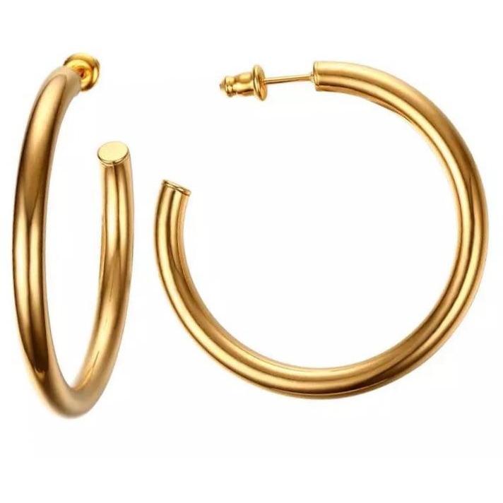 Clara Hoop earrings featuring 18k gold over stainless steel in a tubular design, measuring 2.4 inches.
