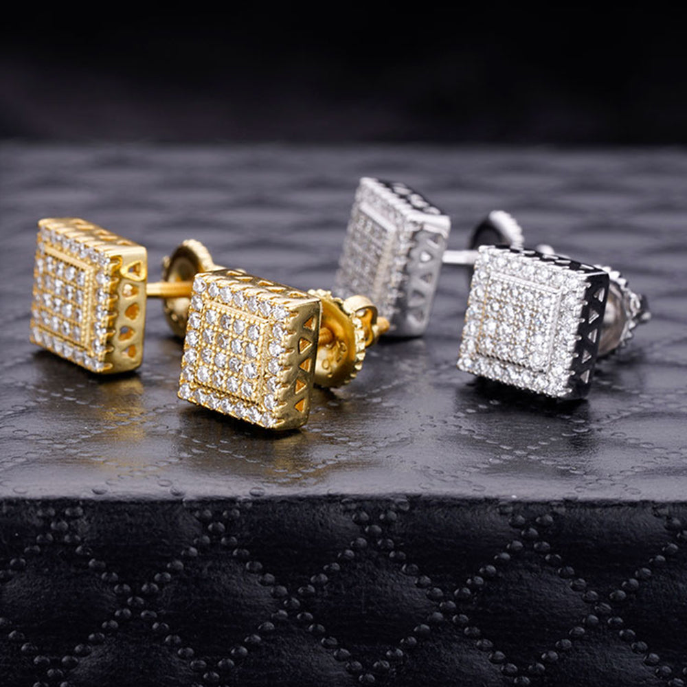 A pair of elegant CLARUS sterling silver earrings featuring cubic zircon stones, designed as screw back studs with a square shape.